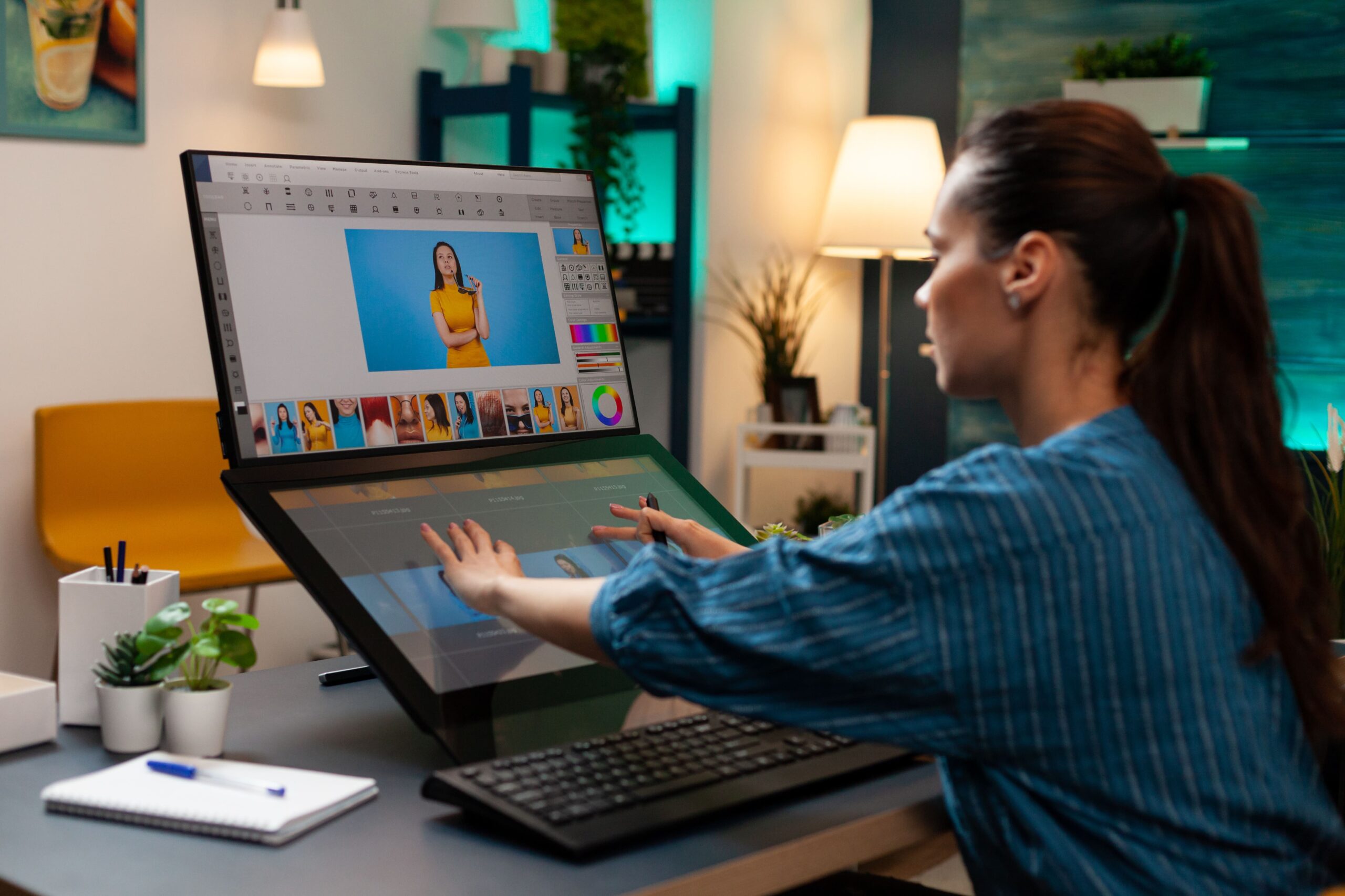 studio-editor-doing-retoucher-work-touch-screen-min